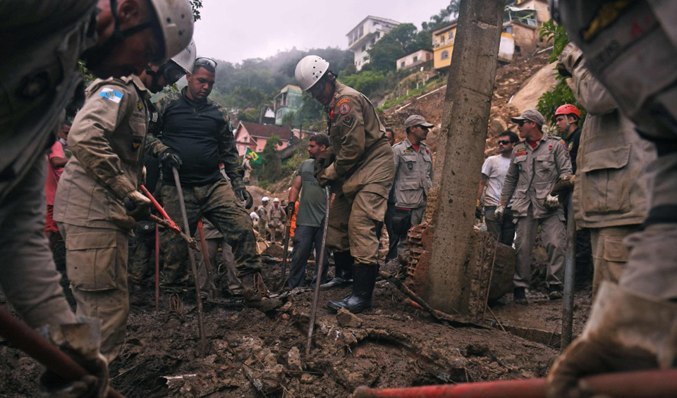 Toll mounts as Brazil storm rescuers retrieve more bodies