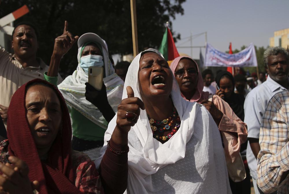 Sudanese protesters demand civilian rule in front of Republican Palace