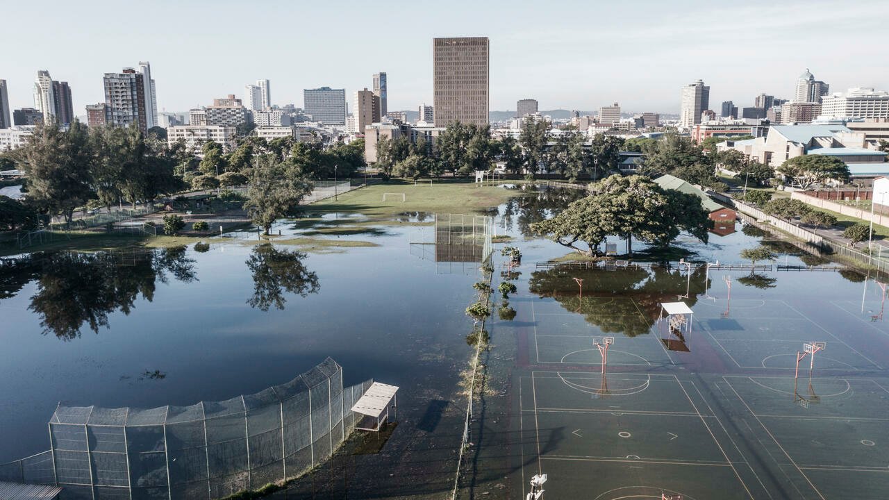 South African rescuers in desperate search for dozens missing in floods