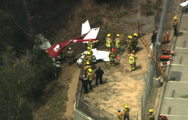 Pilot killed after small plane crashes near freeway in Los Angeles