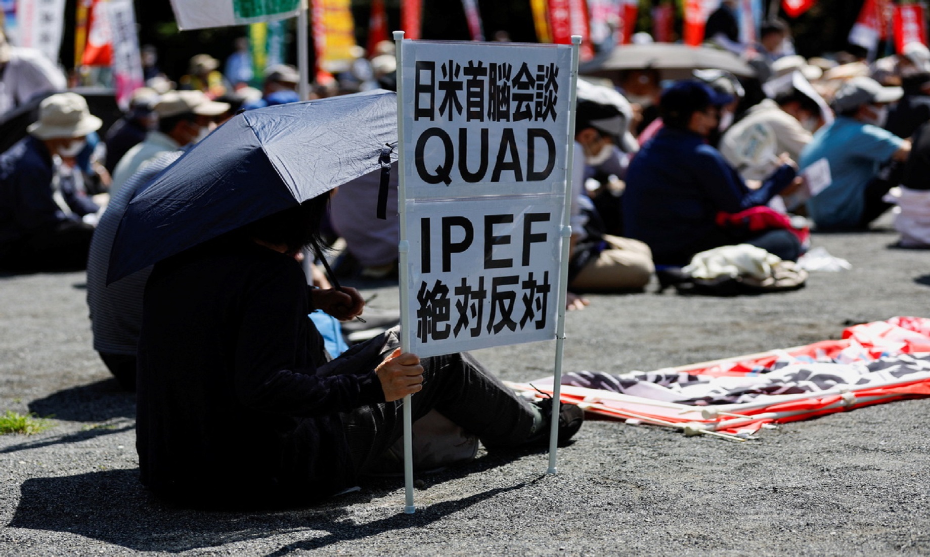 Biden Starts Japan Tour As Protesters Take To The Streets