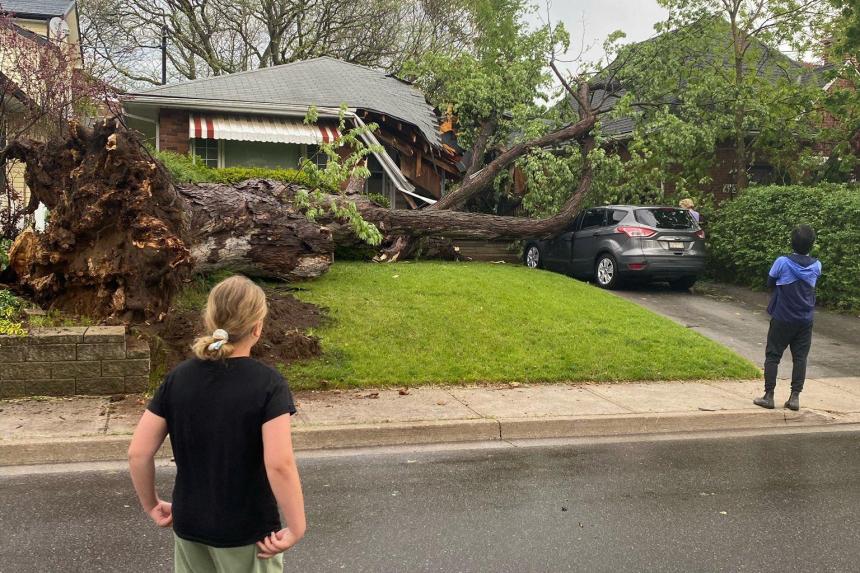 Storms kill at least 8 in Canada, leave half a million without power