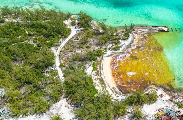 Fuel spills in The Bahamas near the white sand beaches of Great Exuma