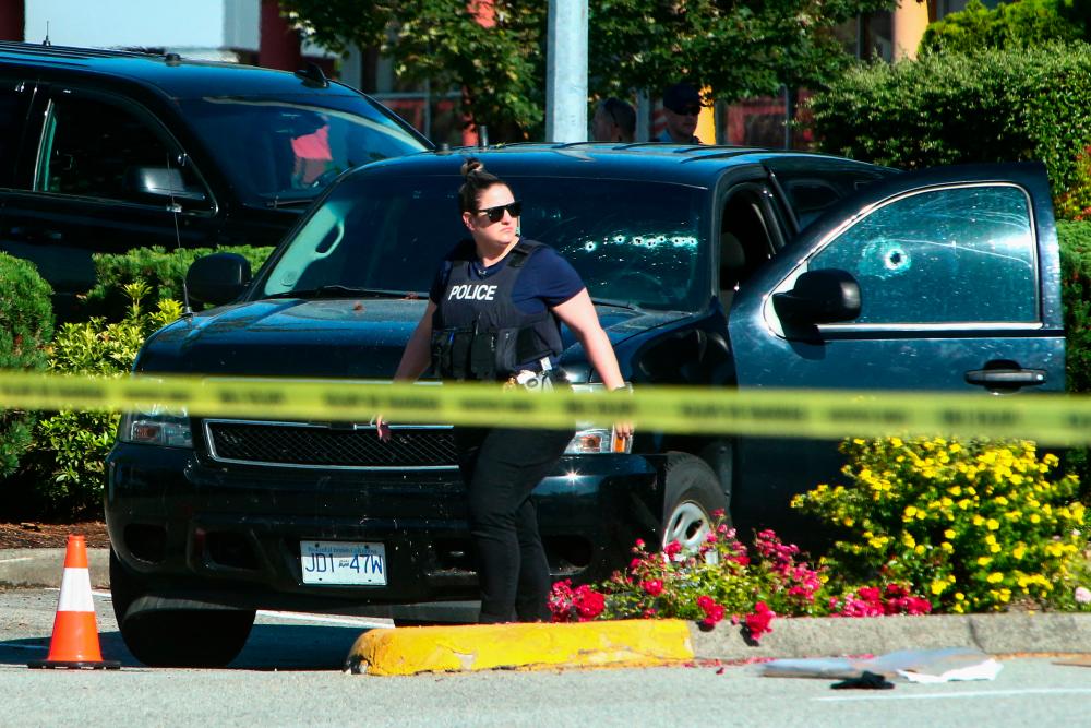 Gunman dead after killing two in Canada shooting spree