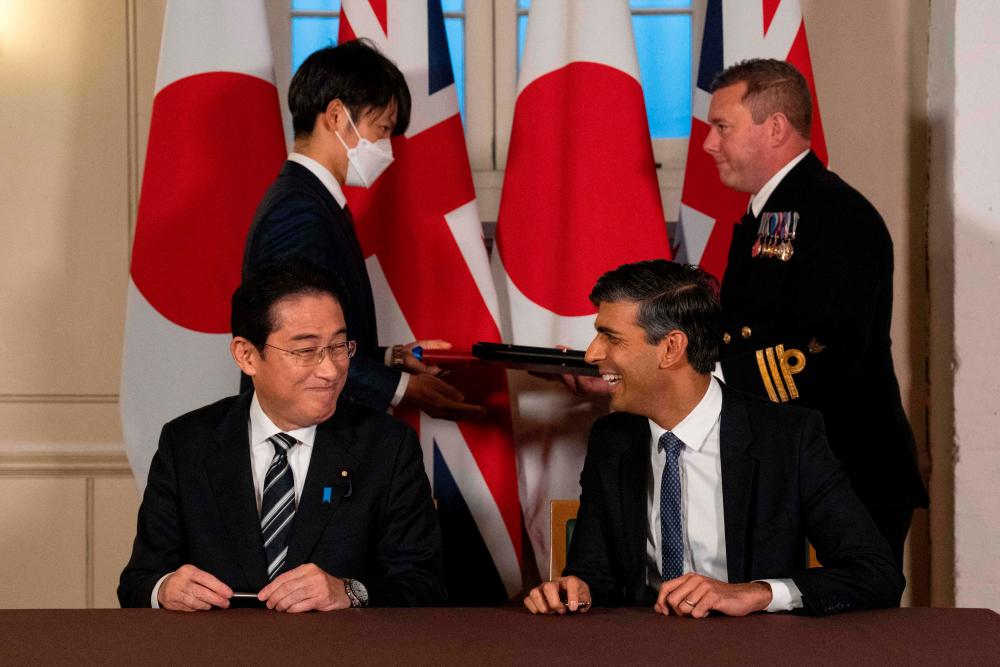 UK, Japan sign major defence deal allowing troop deployments