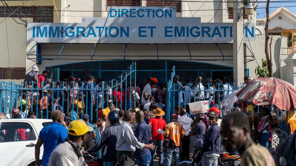 Haitians flock for passports to reach US under new program