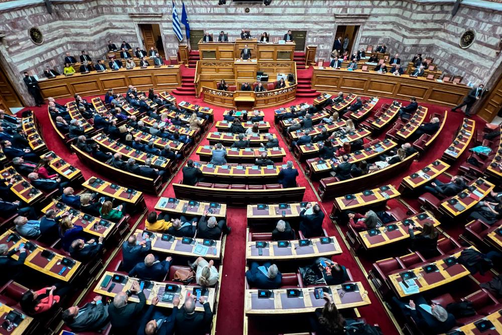 Greek government survives no-confidence vote over a long-running wiretap scandal