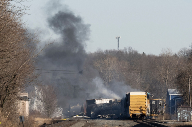 US cargo train derails, causing huge fire and leaking hazardous gas