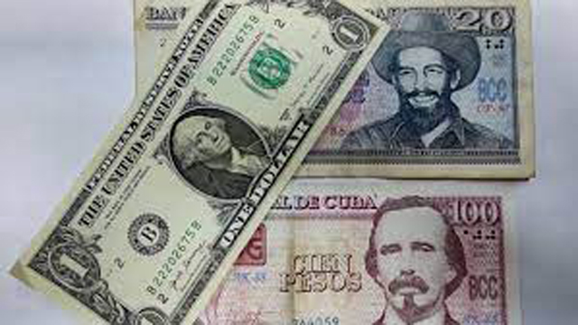 Cuba announces surprise reversal of US dollar deposit ban