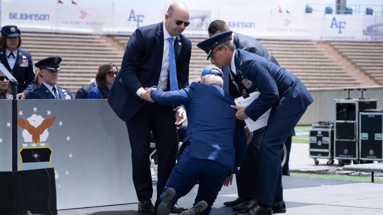 US Pres Biden trips, tumbles on Air Force stage; bumped head against helicopter door