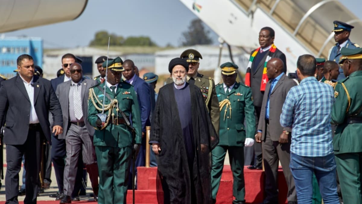 Iran’s Raisi visits fellow outlier Zimbabwe ahead of key vote