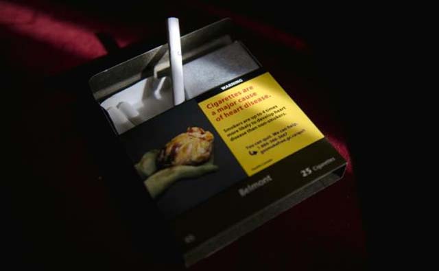 Each cigarette in Canada now comes with warning label – a world first