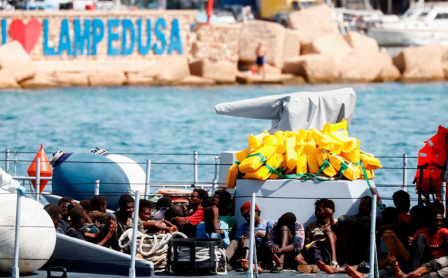 Migrant arrivals set rhythm of life on Lampedusa