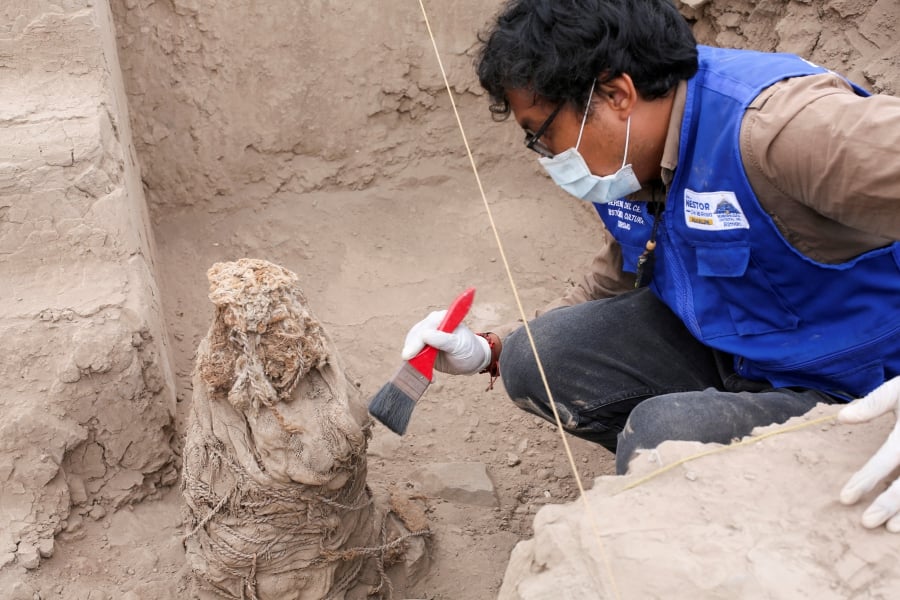 Peru archaeologists unearth 1,000-year-old mummies of children in Lima