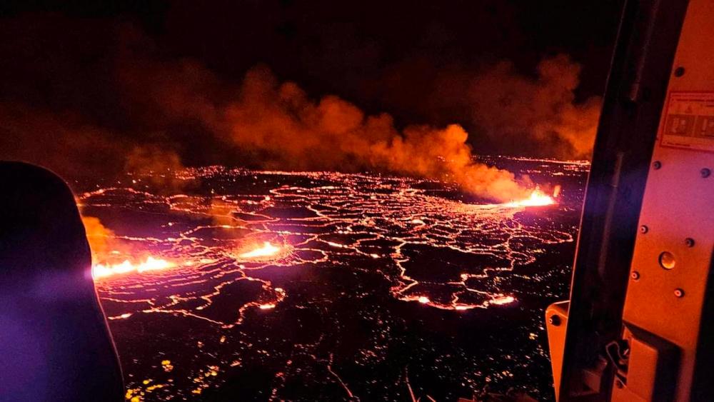 Icelandic volcano eruption eases as evacuated village remains off limits