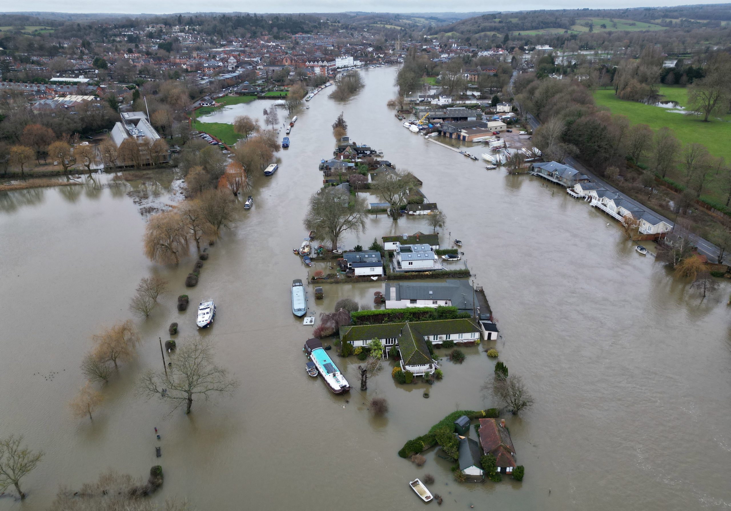 Britain hit by flooding after heavy rain swells major rivers