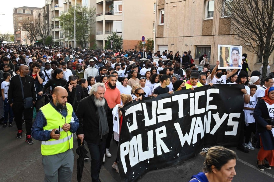 France: Hundreds march in Paris suburb after youth killed in police chase