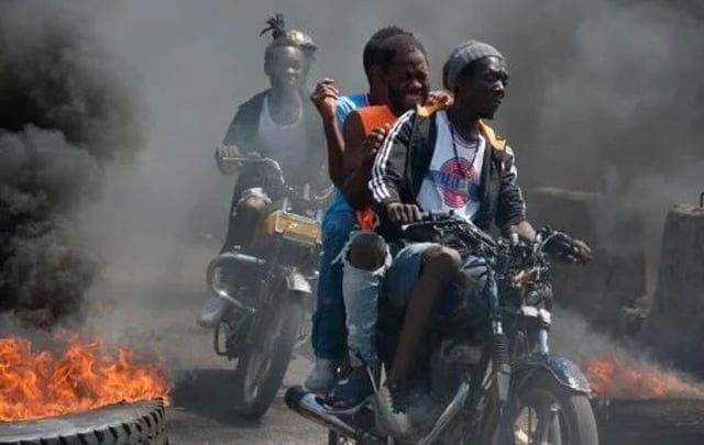 Haiti works at govt transition as gang leader vows to fight on