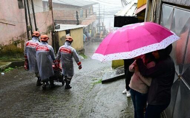 Southeast Brazil battered by downpours, at least a dozen killed