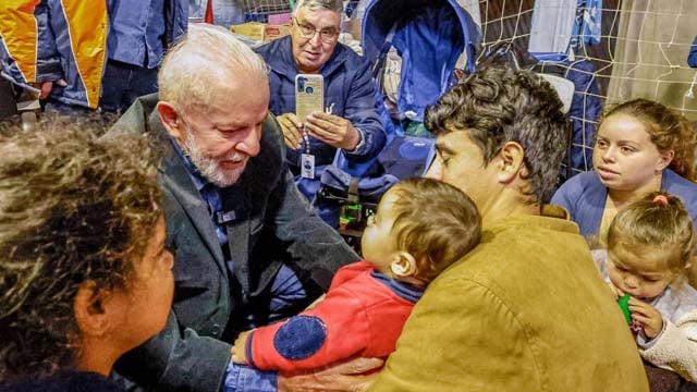 Brazil announces aid to families as Pres Lula visits flooded south