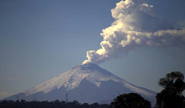 Ecuador volcano rumbles, spews ash cloud