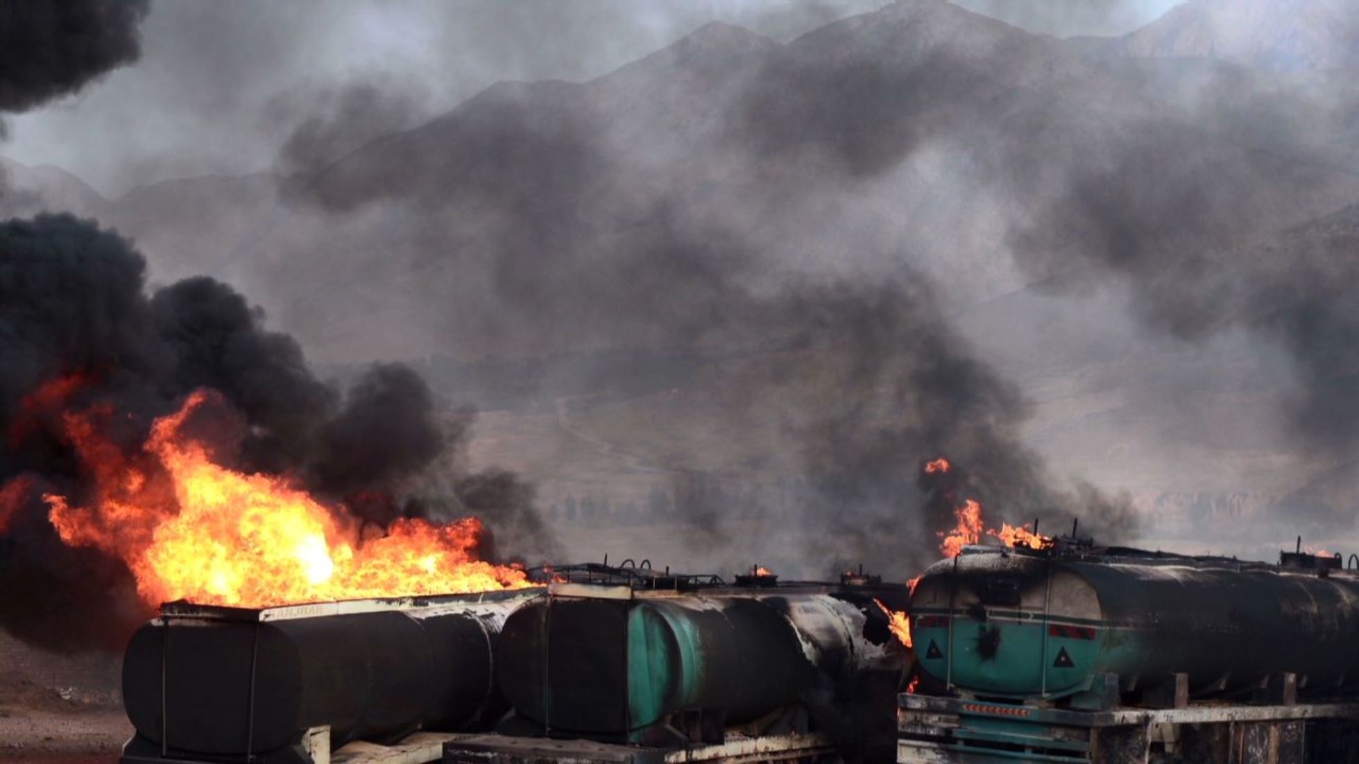 Trucks Turned To Ashes As Customs’ Parking Lot Caught Fire In Western Afghan City