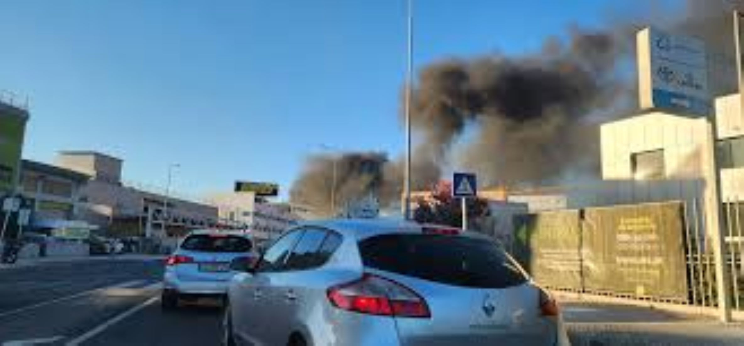 Fire Engulfs Car-Parking Lot Near Lisbon Airport