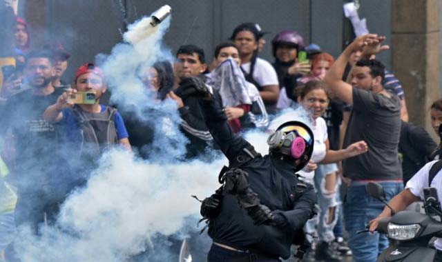 Venezuela: Pres Maduro urges state ‘iron fist’ as protest toll mounts