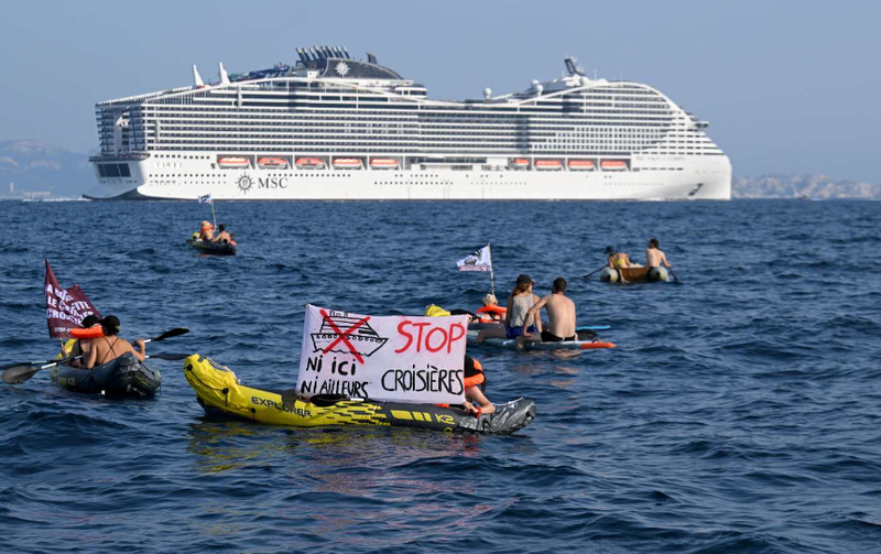 Netherlands: Climate activists block cruise ship arriving in Amsterdam