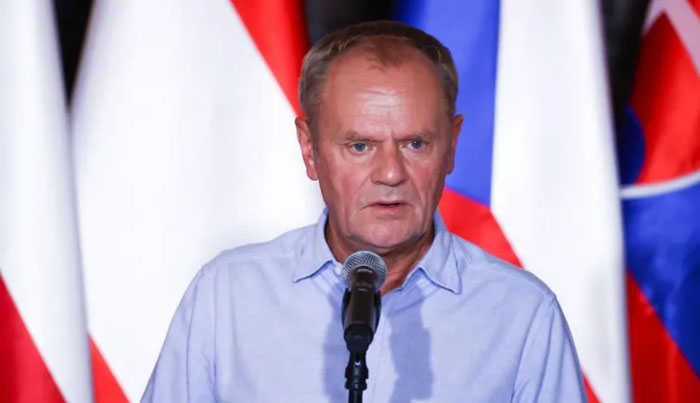 Poland to temporarily suspend right to asylum, PM Tusk says