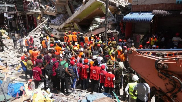 Tanzania: Rescuers send water through holes to people trapped in building collapse