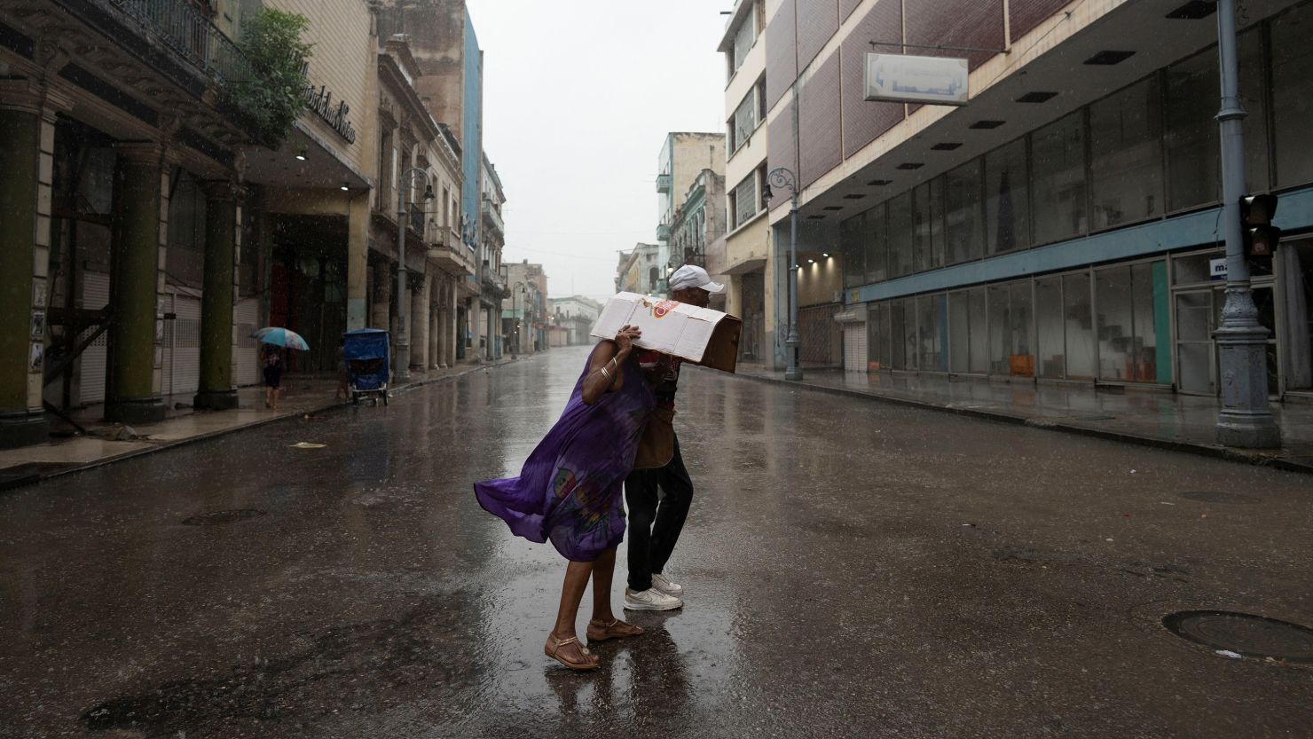 Hurricane Rafael makes landfall in Cuba as a Category 3 storm, causing power system to collapse