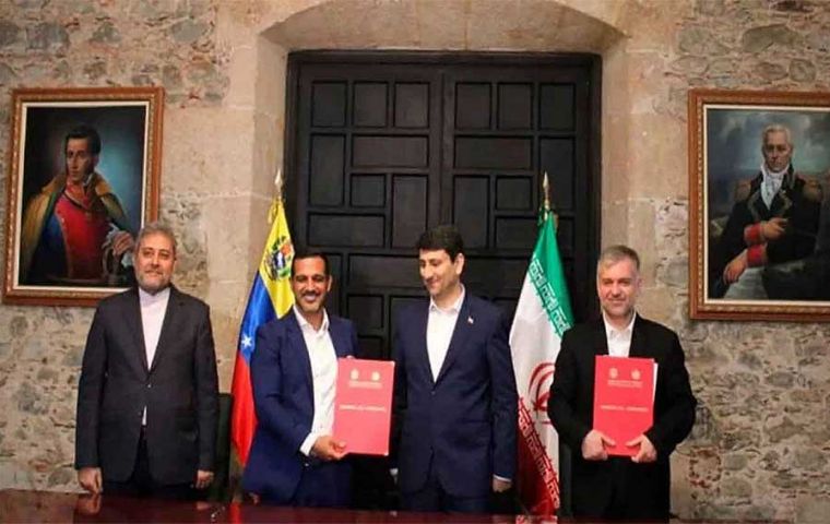 Venezuela and Iran sign deal for optic fiber plant