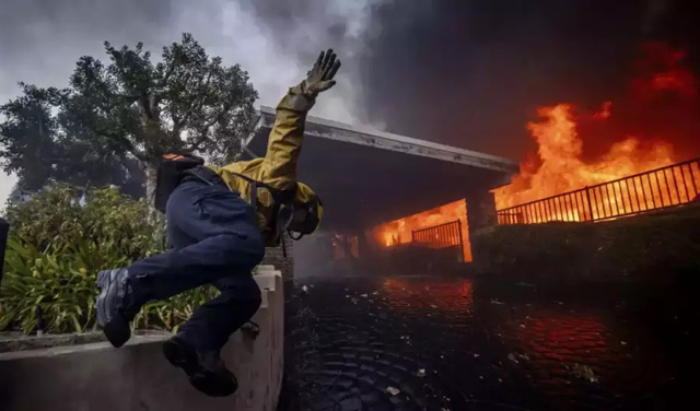 Update: Los Angeles investigates fire blame as curfew enforced