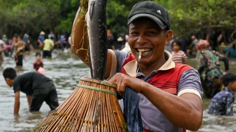 Hundreds Of Villagers Celebrate Traditional Fish-Catching Ceremony In Cambodia